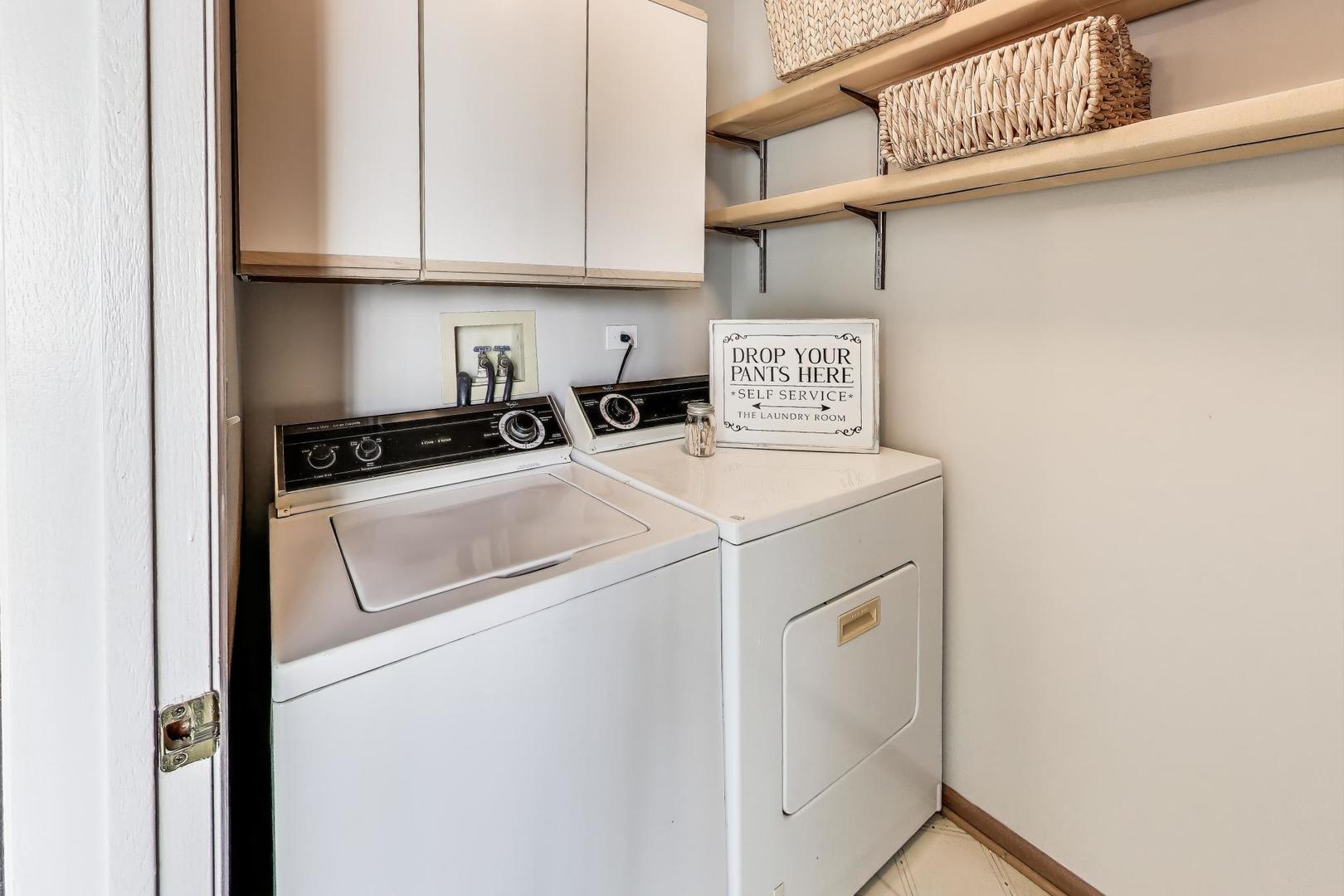 985 Manchester Circle, Unit 985 Grayslake, IL 60030 - Photo 7 of 17 a utility room with dryer and washer