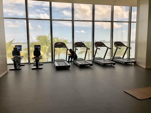 a view of a room with gym equipment