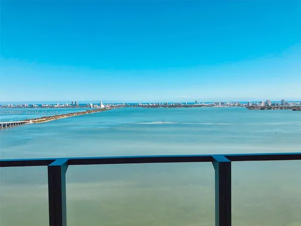 a view of a lake from a balcony