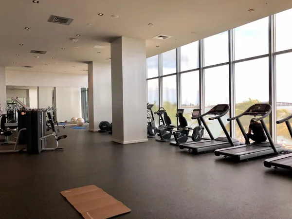 a view of a room with gym equipment