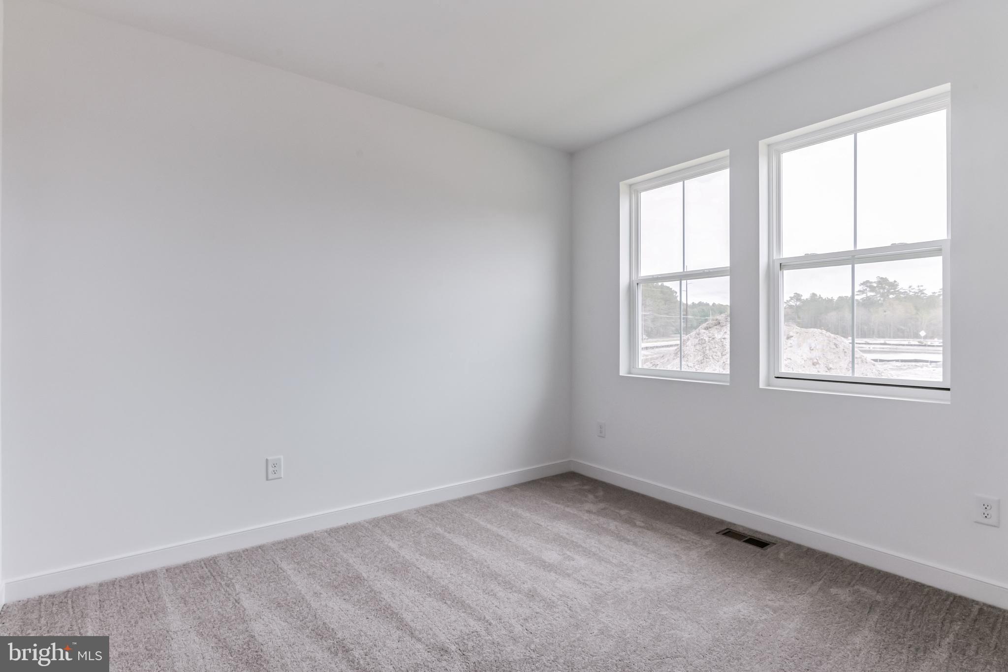 36449 Maple Ridge Lane Georgetown, DE 19947 - Photo 16 of 39 an empty room with a window