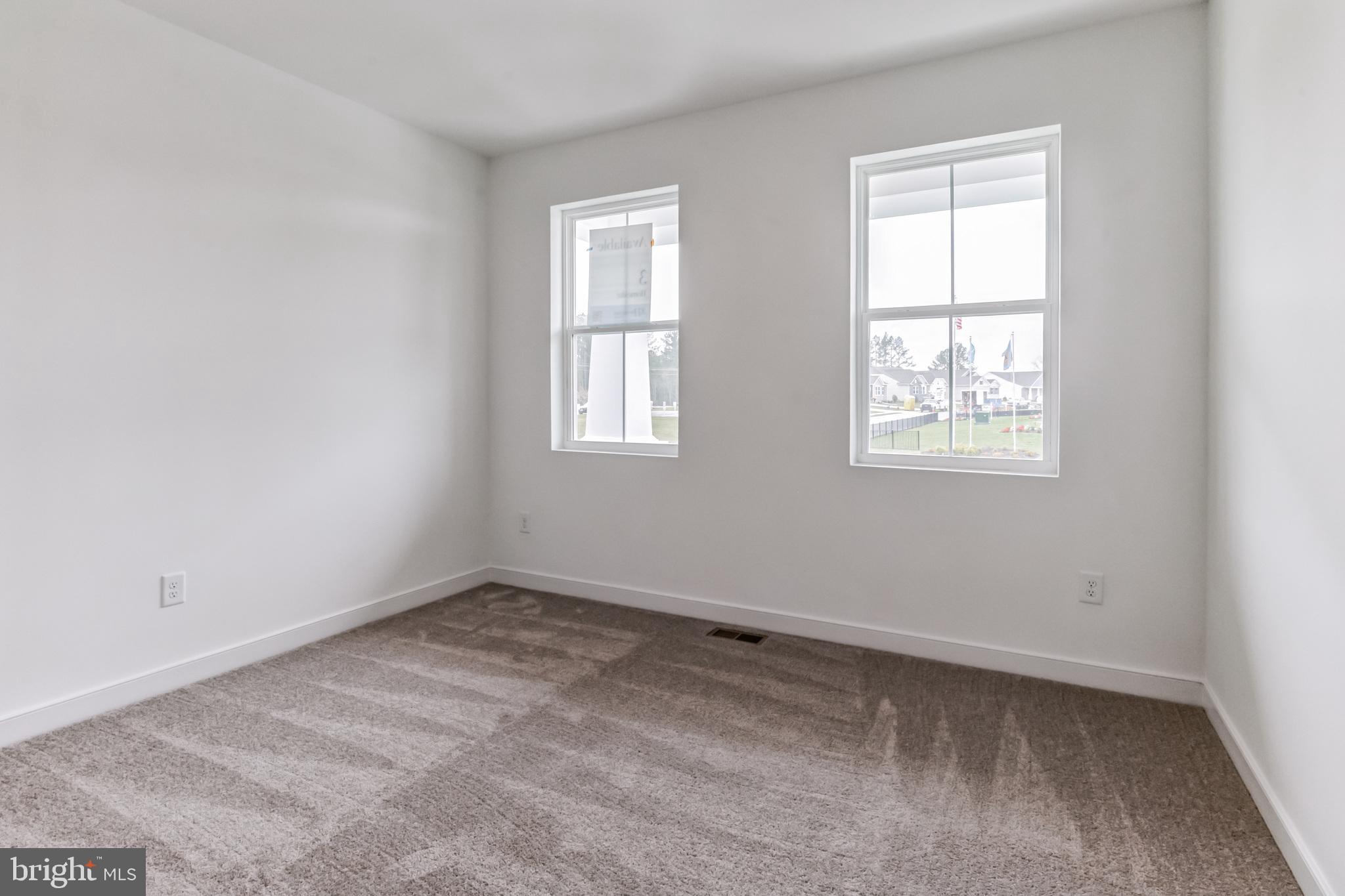 36449 Maple Ridge Lane Georgetown, DE 19947 - Photo 27 of 39 an empty room with a window