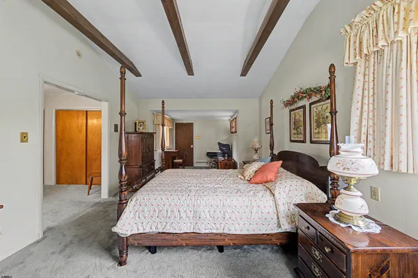 a view of an empty room with stairs