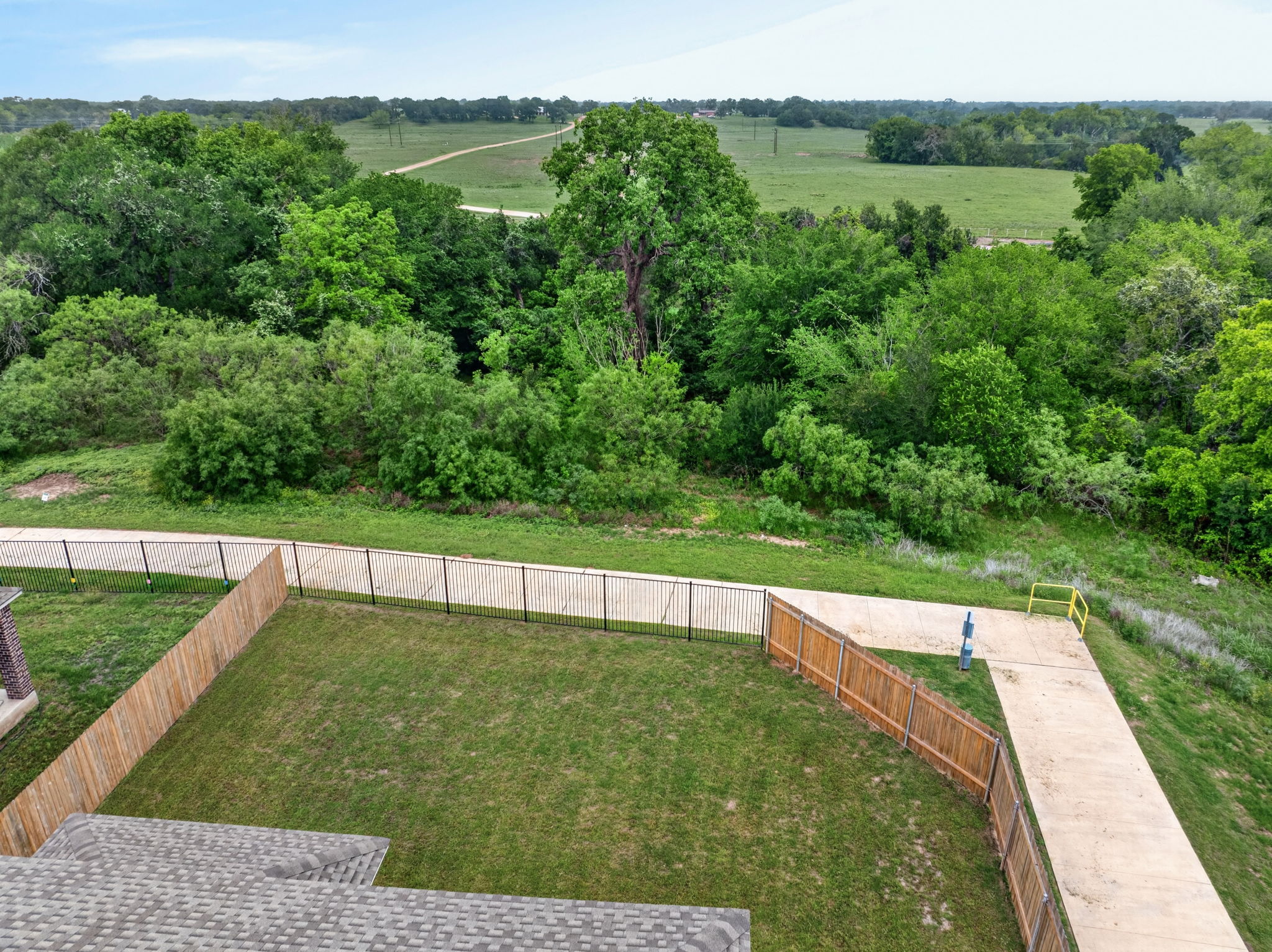 326 Linden Street Bastrop, TX 78602 - Photo 33 of 39 Backyard overlooking the greenbelt.