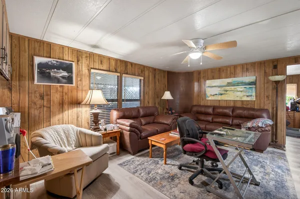 a living room with furniture or couch and a window