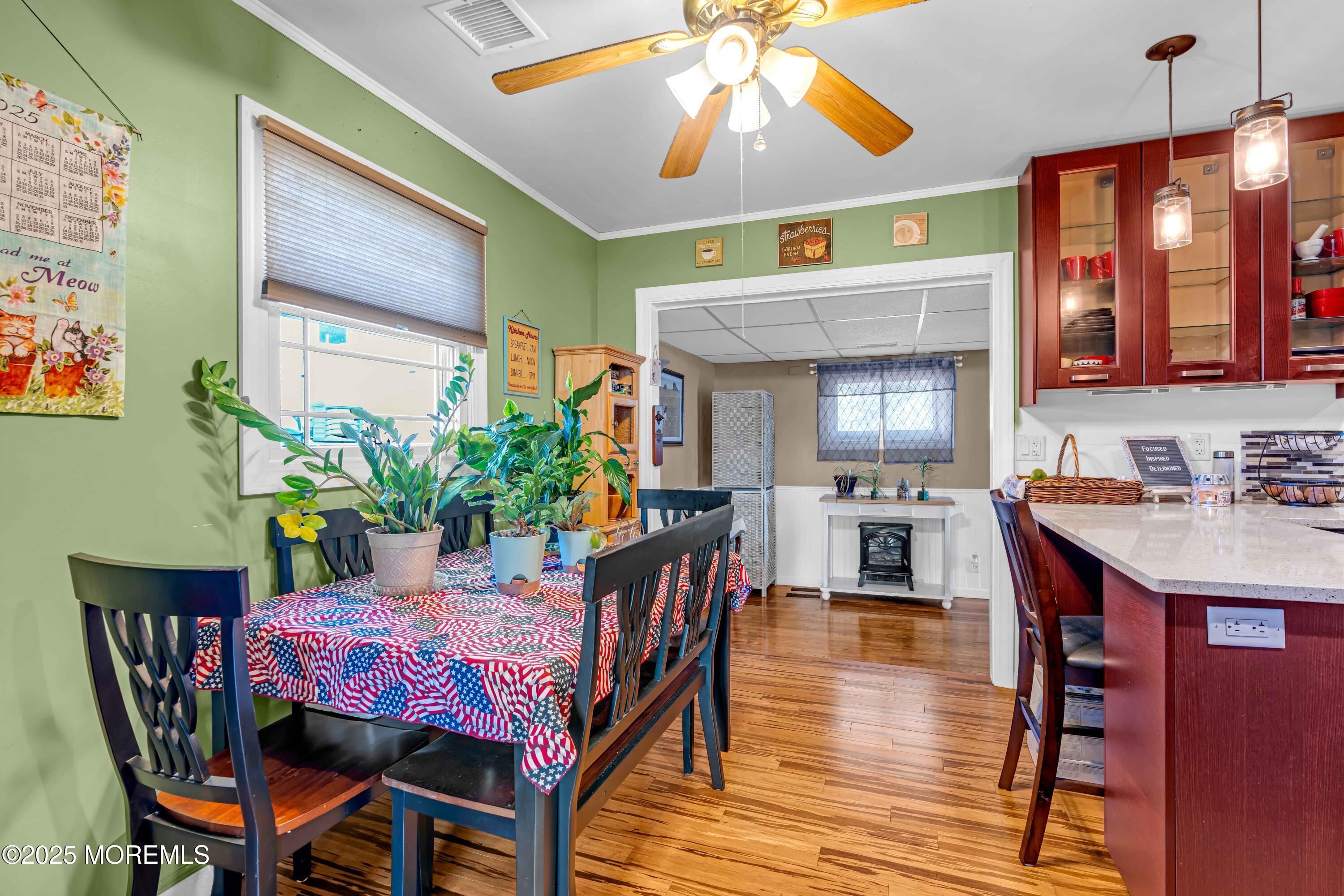 64 Roland Street Keansburg, NJ 07734 - Photo 14 of 38 a view of a dining room with furniture and chandelier