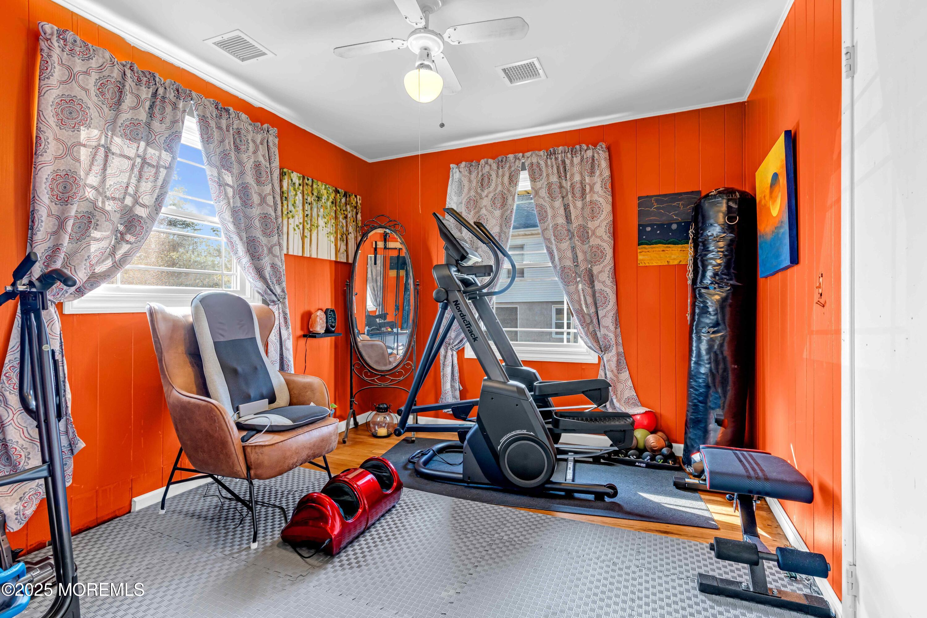 64 Roland Street Keansburg, NJ 07734 - Photo 23 of 38 a view of gym equipment with windows