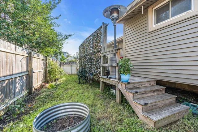 a backyard of a house with seating space