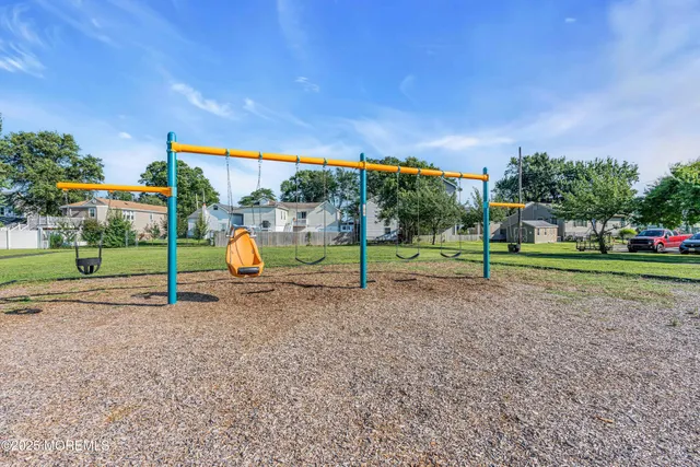 a view of a park with swings