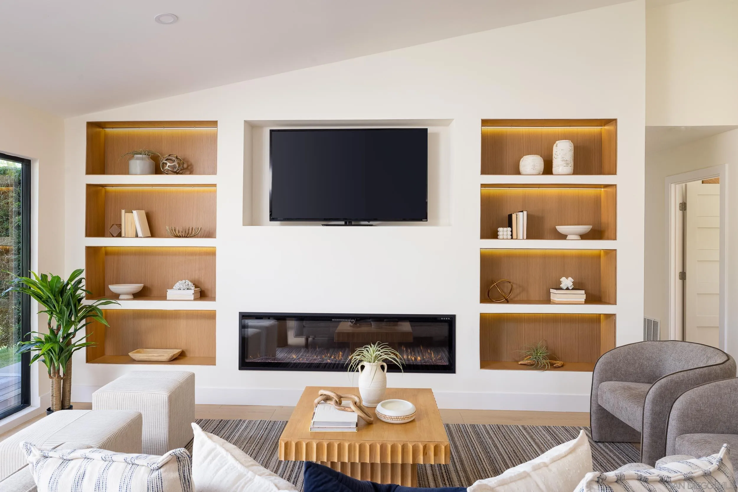 1502 Vanessa Circle Encinitas, CA 92024 - Photo 17 of 40 a living room with furniture and a fireplace