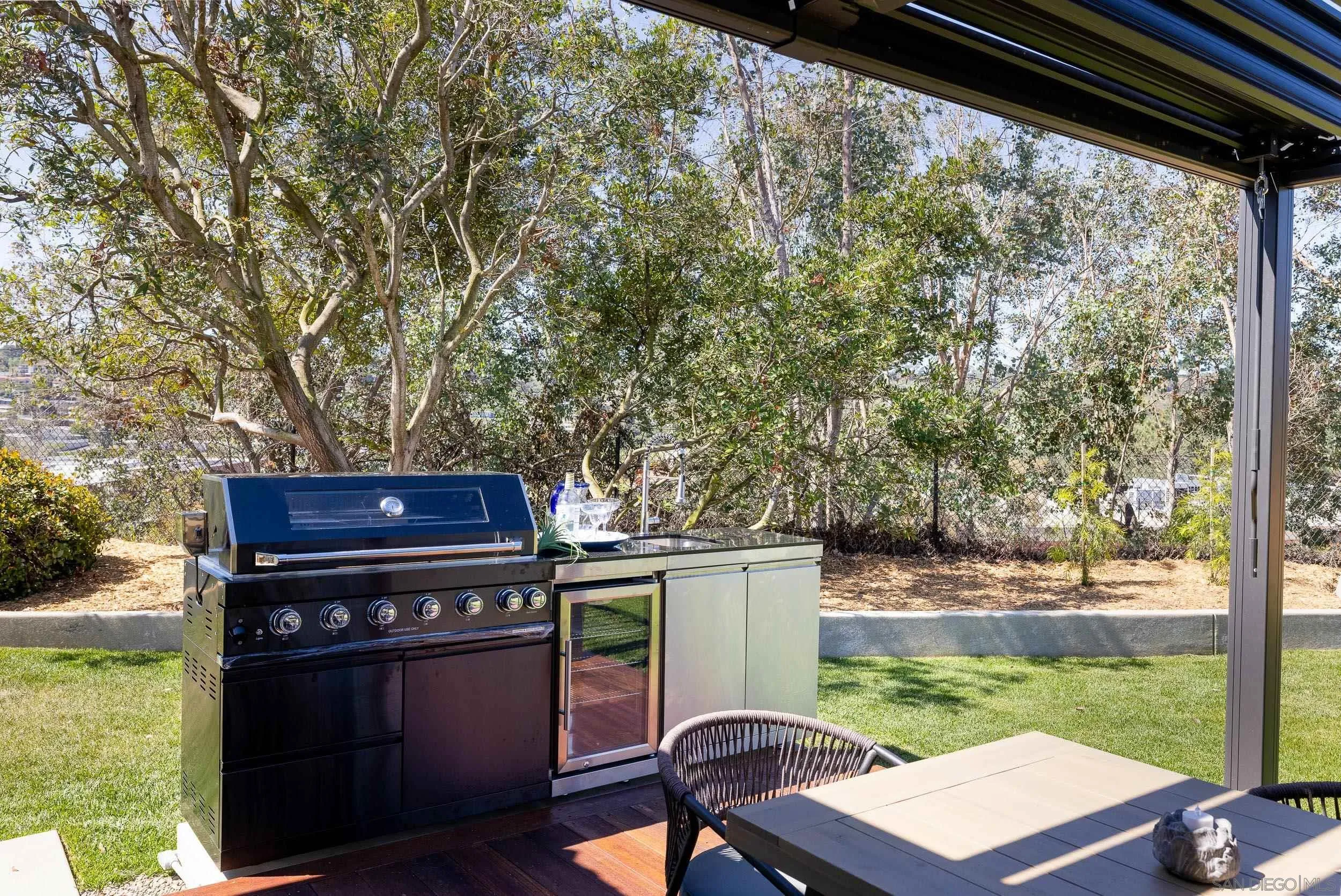 1502 Vanessa Circle Encinitas, CA 92024 - Photo 32 of 40 a view of a yard with furniture and wooden floor