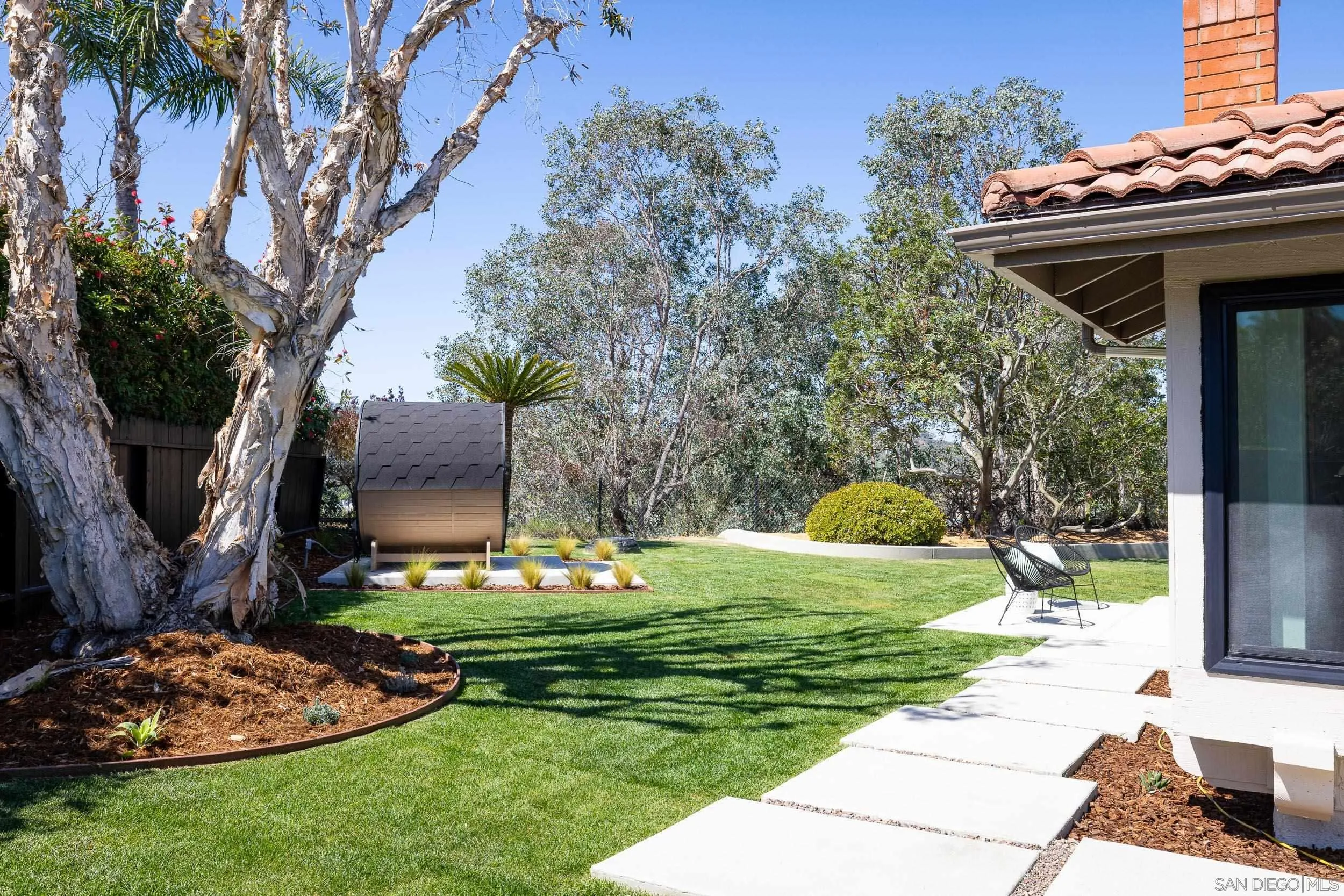 1502 Vanessa Circle Encinitas, CA 92024 - Photo 39 of 40 a front view of a house with garden