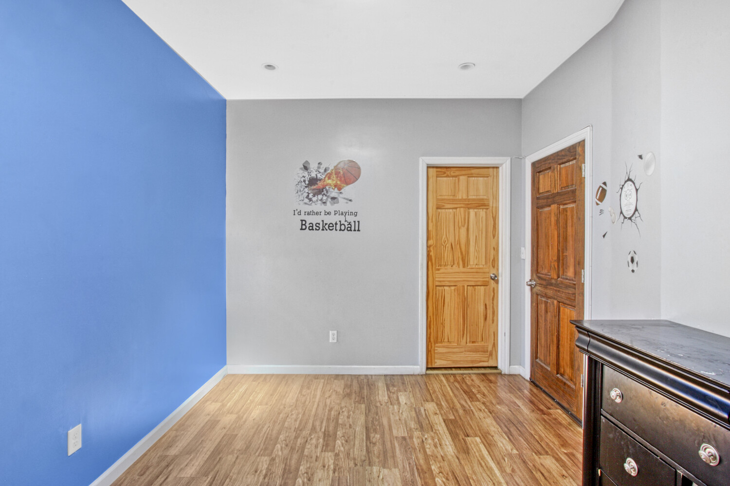 614 St Johns Place Brooklyn, NY 11238 - Photo 11 of 34 a view of an empty room with window and wooden floor