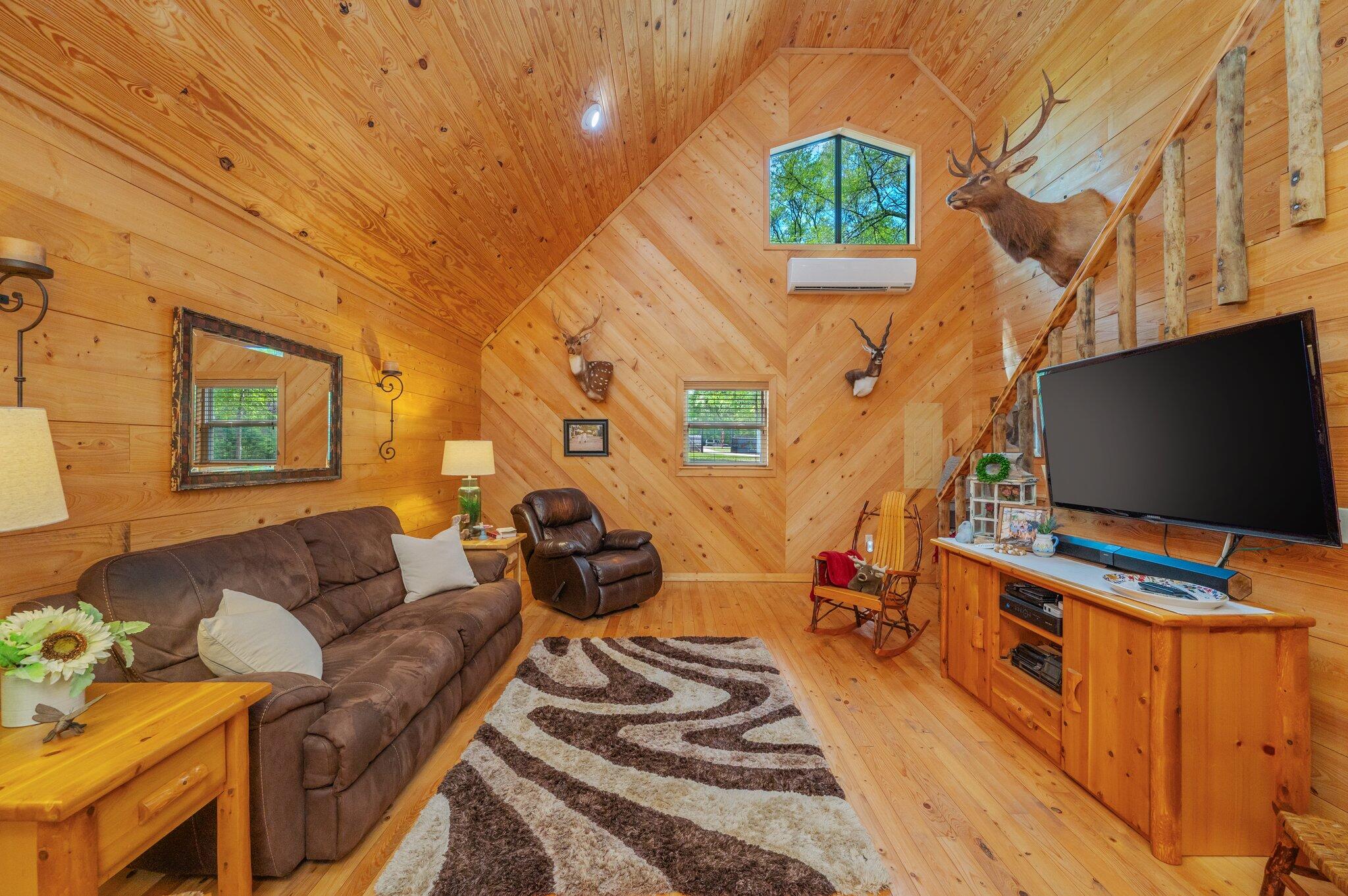 8109 Highway 189 Baker, FL 32531 - Photo 15 of 95 a living room with furniture and a flat screen tv
