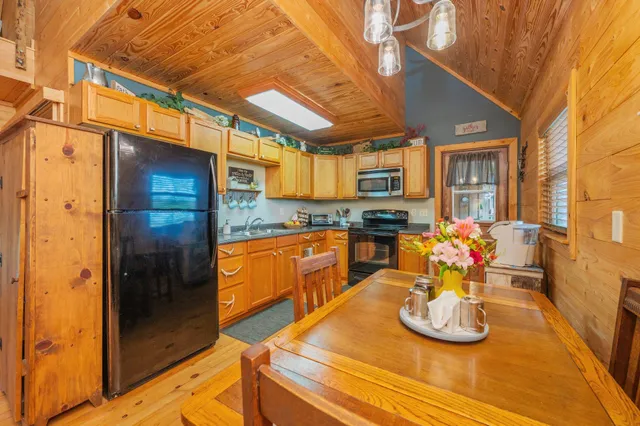 a bathroom with a double vanity sink and mirror