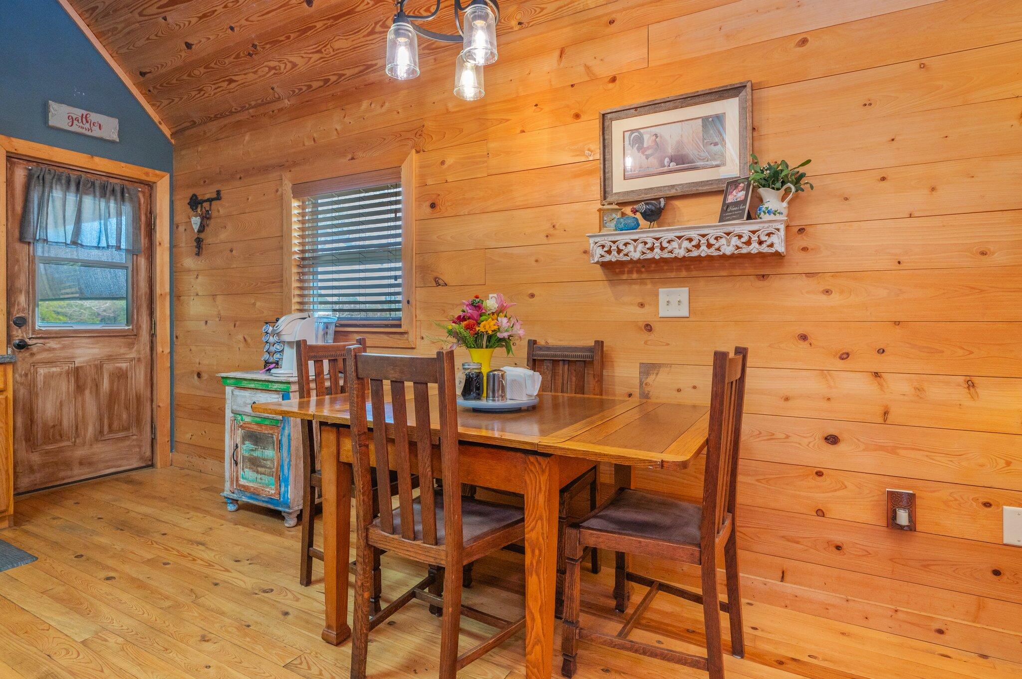 8109 Highway 189 Baker, FL 32531 - Photo 22 of 95 a view of a dining room with furniture and wooden floor