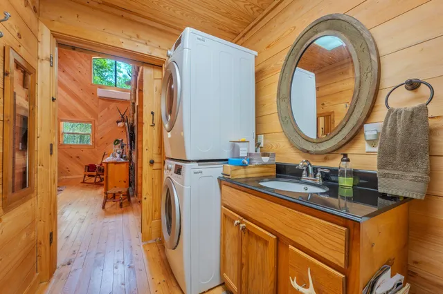 a view of a house with wooden deck
