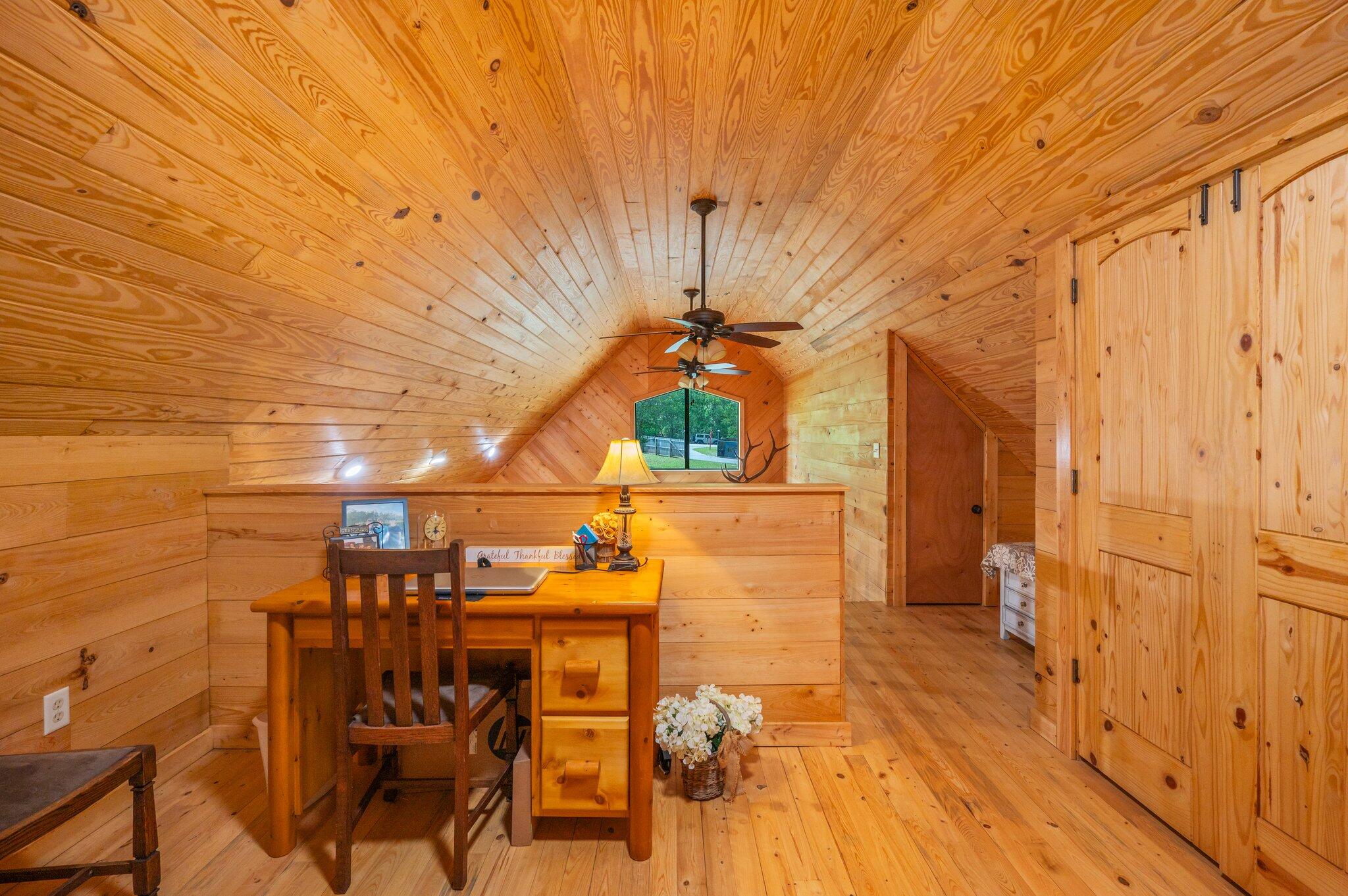8109 Highway 189 Baker, FL 32531 - Photo 36 of 95 a view of a patio with table and chairs with wooden floor