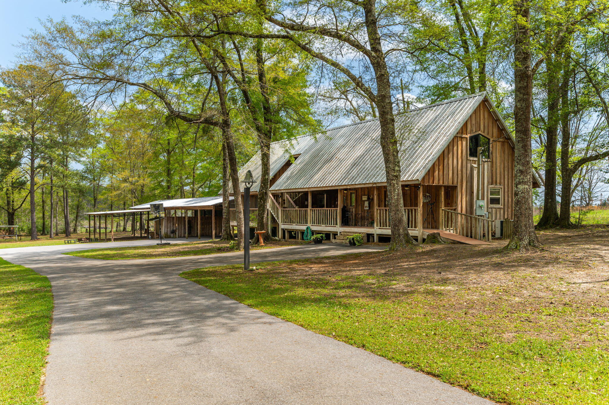 8109 Highway 189 Baker, FL 32531 - Photo 4 of 95 a view of a house with a yard and large trees