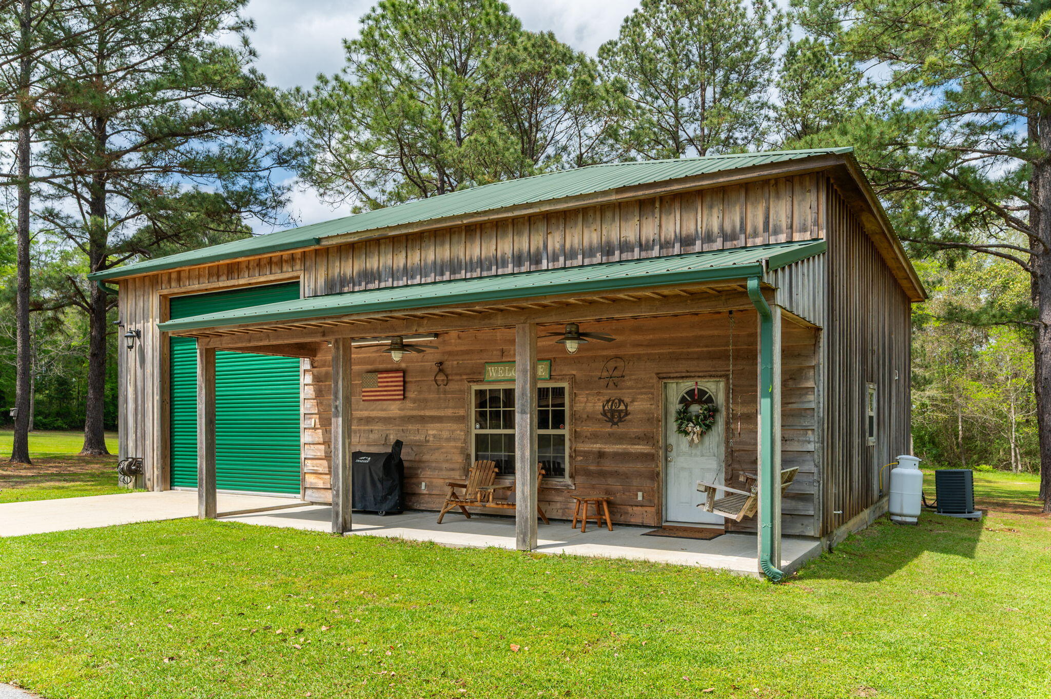 8109 Highway 189 Baker, FL 32531 - Photo 53 of 95 a view of a house with a yard and a large tree
