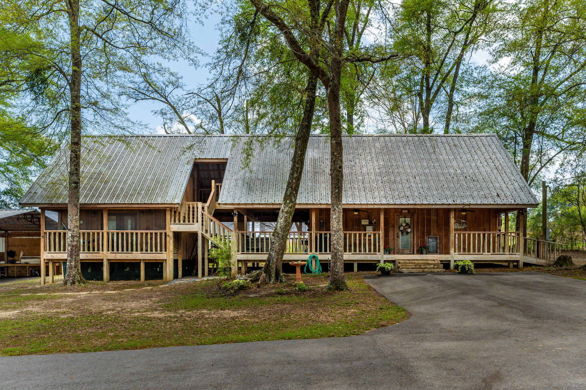8109 Highway 189 Baker, FL 32531 - Photo 6 of 95 front view of a house with a tree