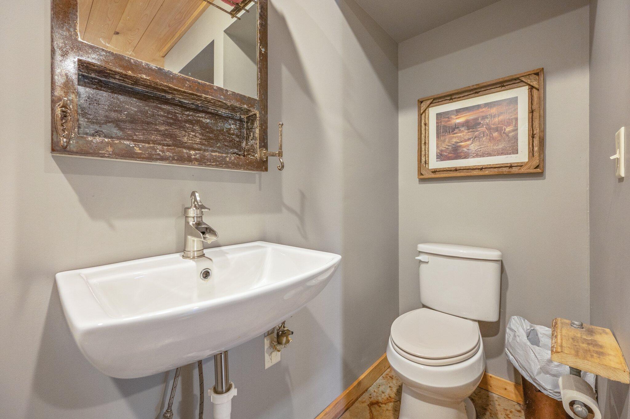 8109 Highway 189 Baker, FL 32531 - Photo 63 of 95 a bathroom with a sink and a toilet