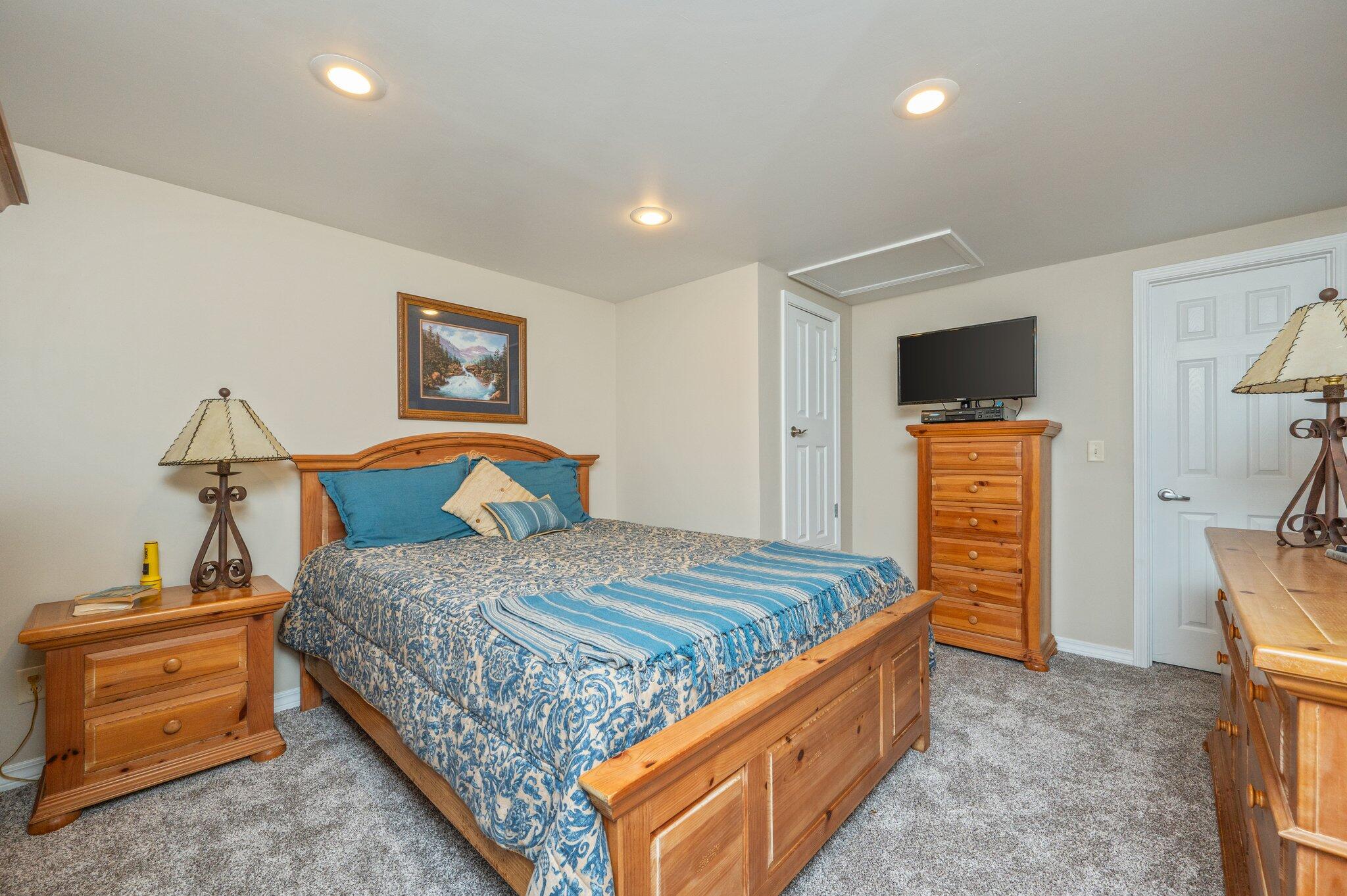 8109 Highway 189 Baker, FL 32531 - Photo 72 of 95 a bedroom with bed and cabinets