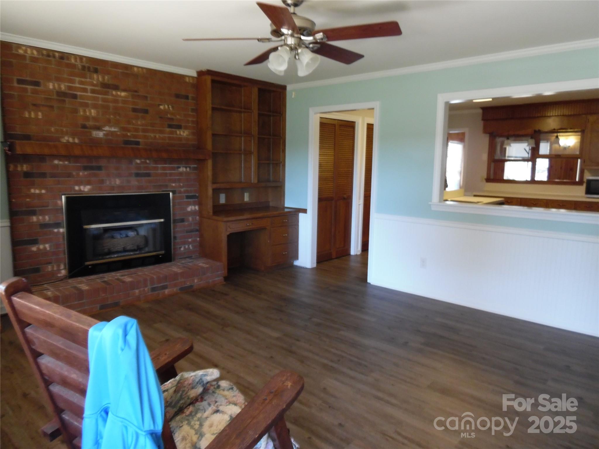 3857 Buffalo Shoals Road Maiden, NC 28650 - Photo 18 of 27 a living room with furniture wooden floor and a fireplace