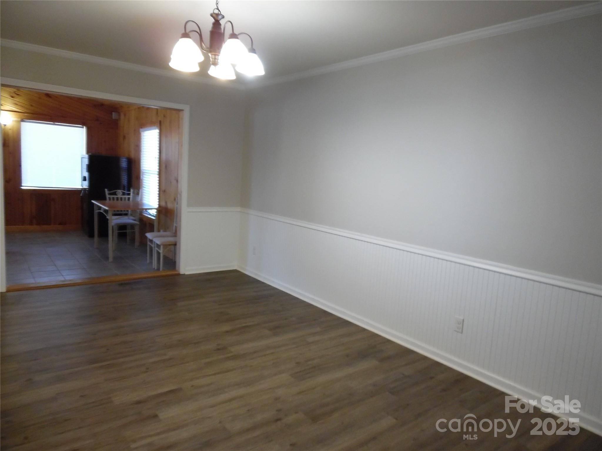 3857 Buffalo Shoals Road Maiden, NC 28650 - Photo 19 of 27 a view of empty room with wooden floor and fan