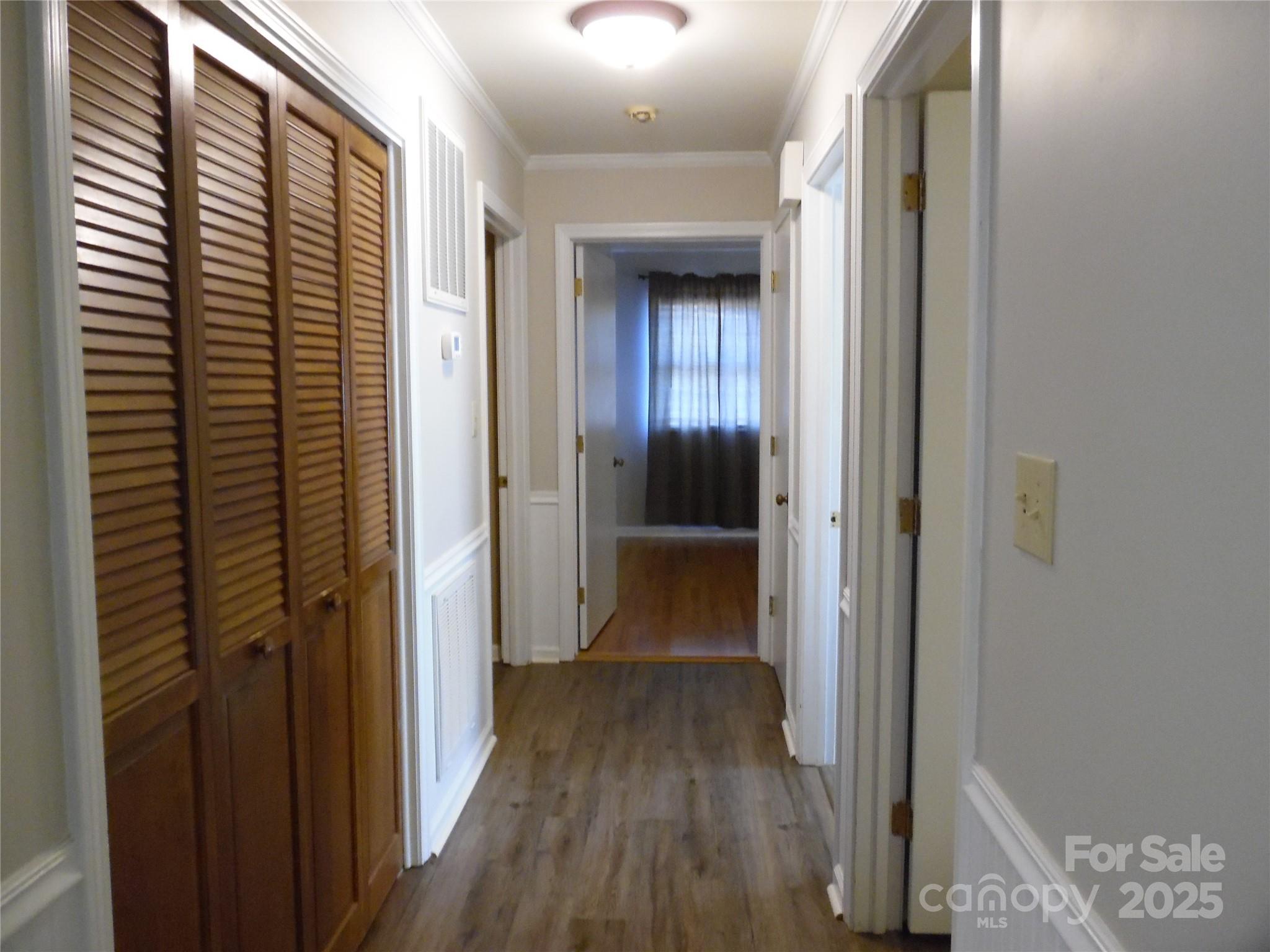 3857 Buffalo Shoals Road Maiden, NC 28650 - Photo 20 of 27 a view of a hallway with wooden floor