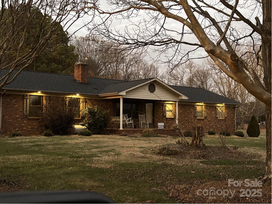 3857 Buffalo Shoals Road Maiden, NC 28650 - Photo 2 of 27 a front view of a house with a yard