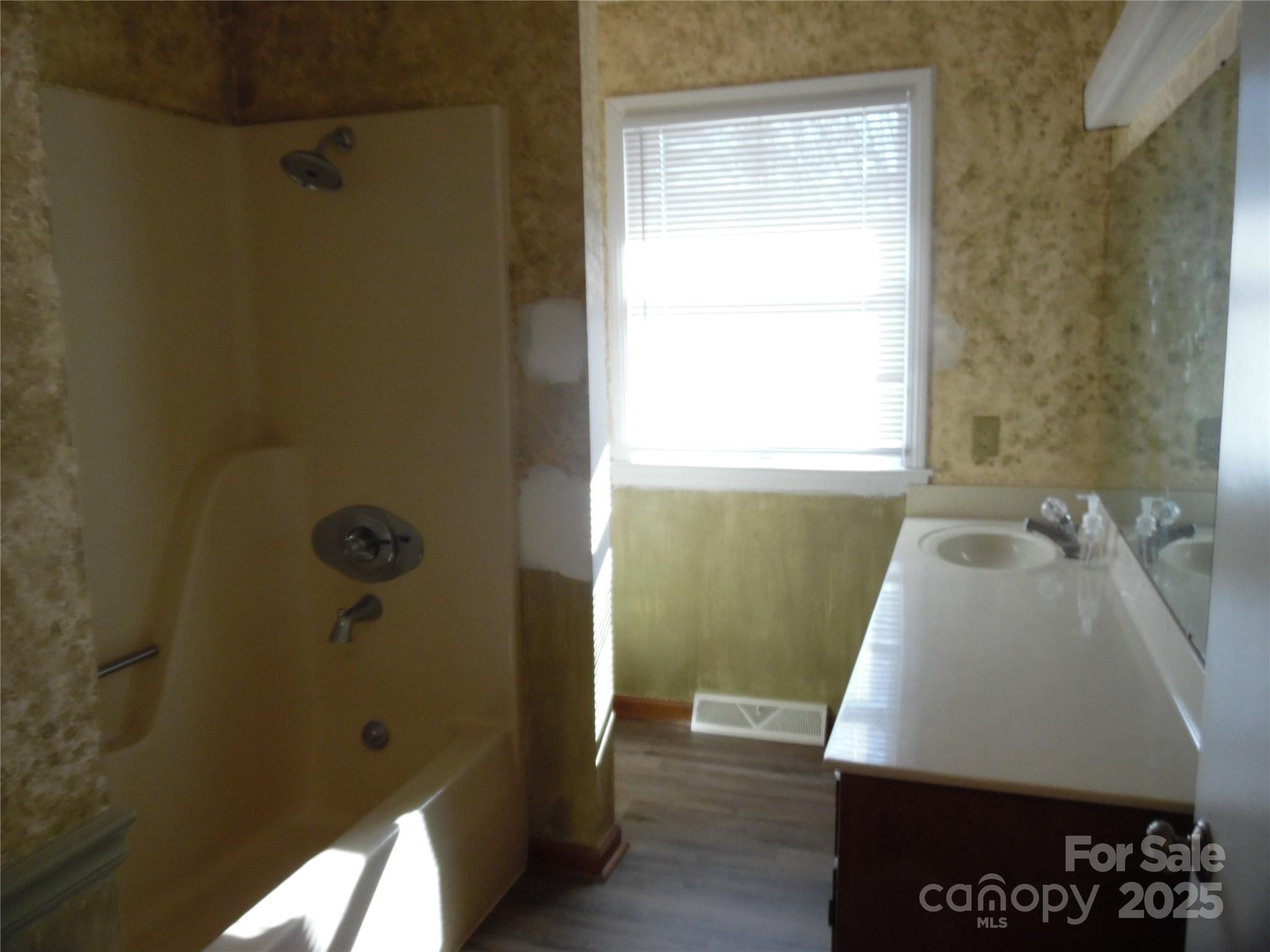 3857 Buffalo Shoals Road Maiden, NC 28650 - Photo 22 of 27 a bathroom with a sink and a shower
