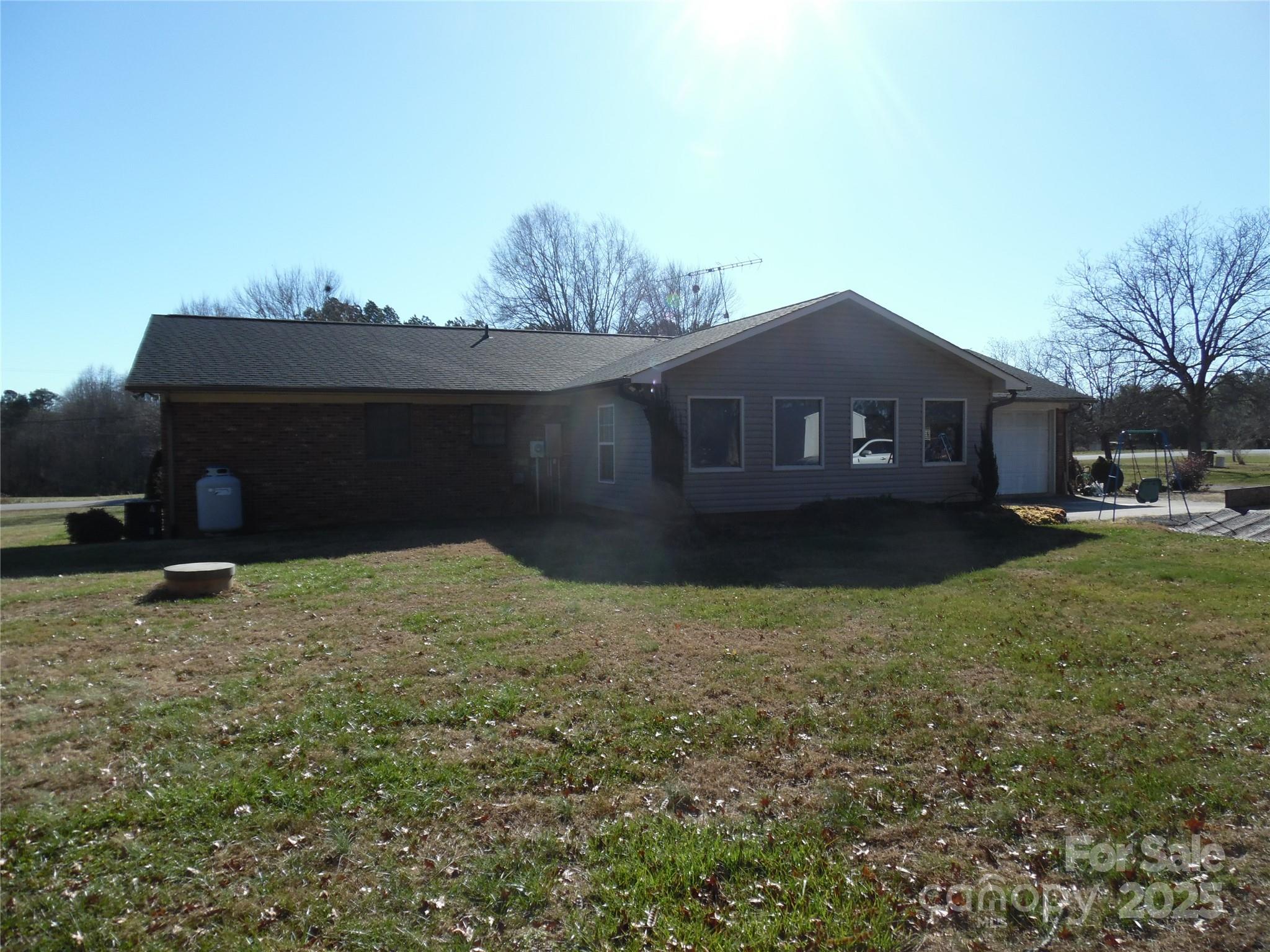 3857 Buffalo Shoals Road Maiden, NC 28650 - Photo 5 of 27 a house view with a garden space