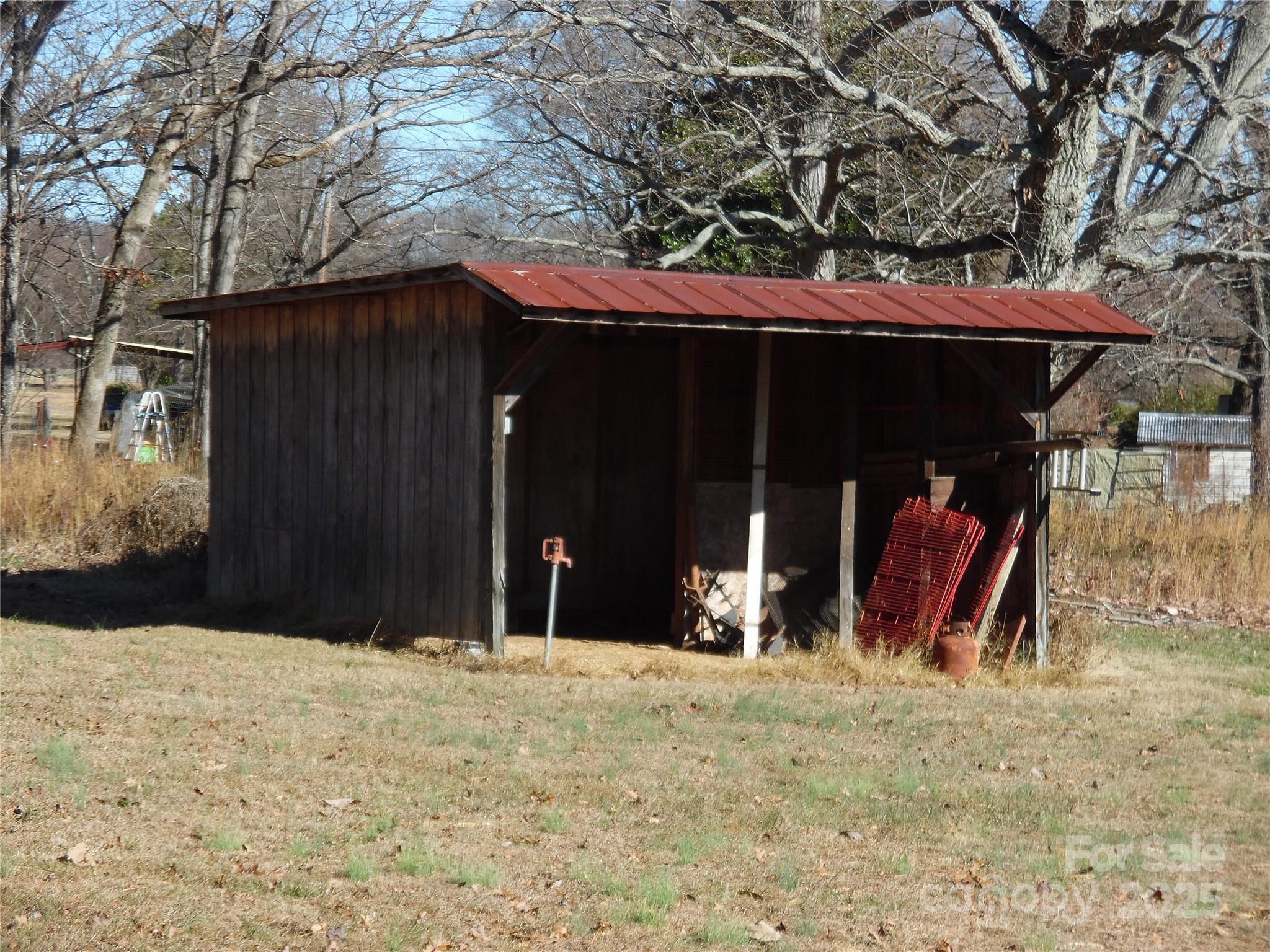 3857 Buffalo Shoals Road Maiden, NC 28650 - Photo 7 of 27 a view of a backyard