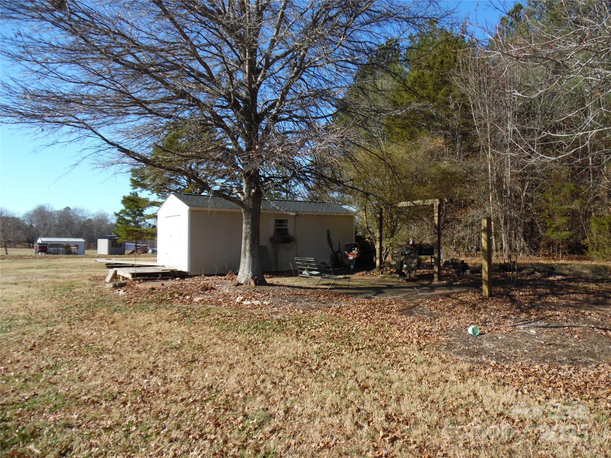 3857 Buffalo Shoals Road Maiden, NC 28650 - Photo 8 of 27 a view of a house with a yard and garage