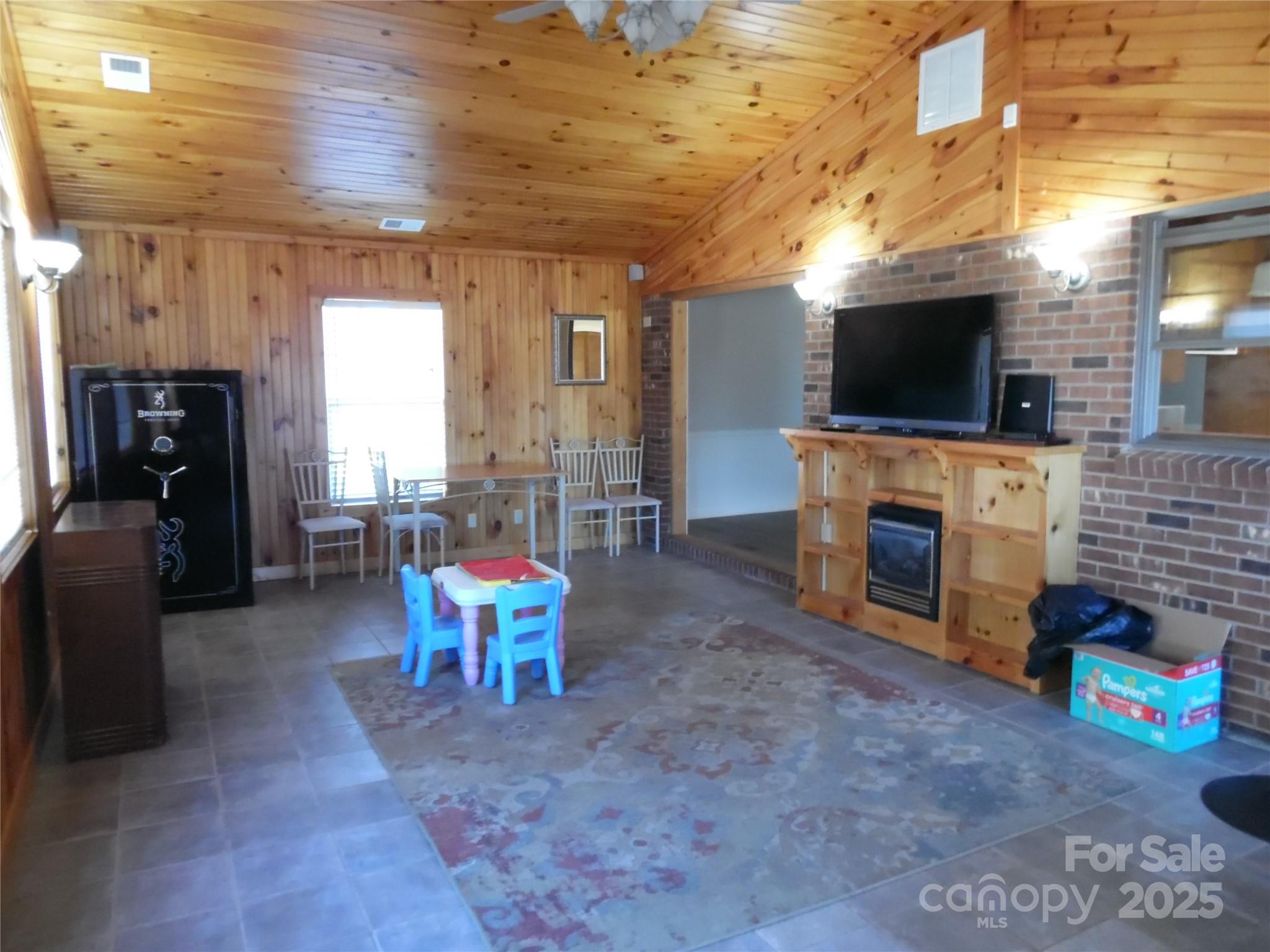3857 Buffalo Shoals Road Maiden, NC 28650 - Photo 10 of 27 a living room with furniture and a flat screen tv