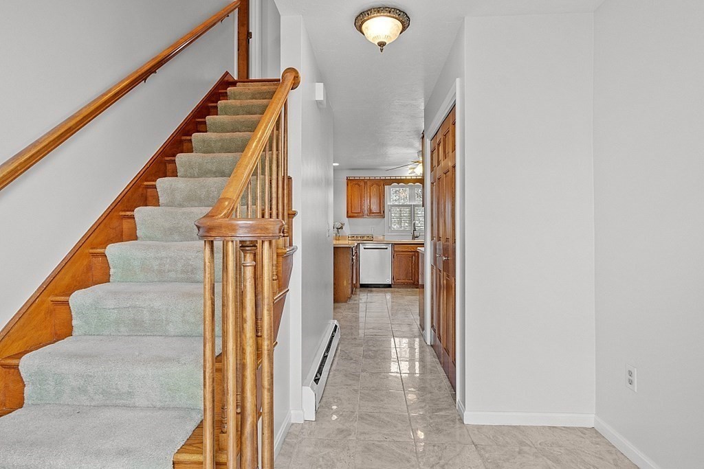5 Sycamore Drive Rutland, MA 01543 - Photo 4 of 41 a view of entryway and hall with wooden floor