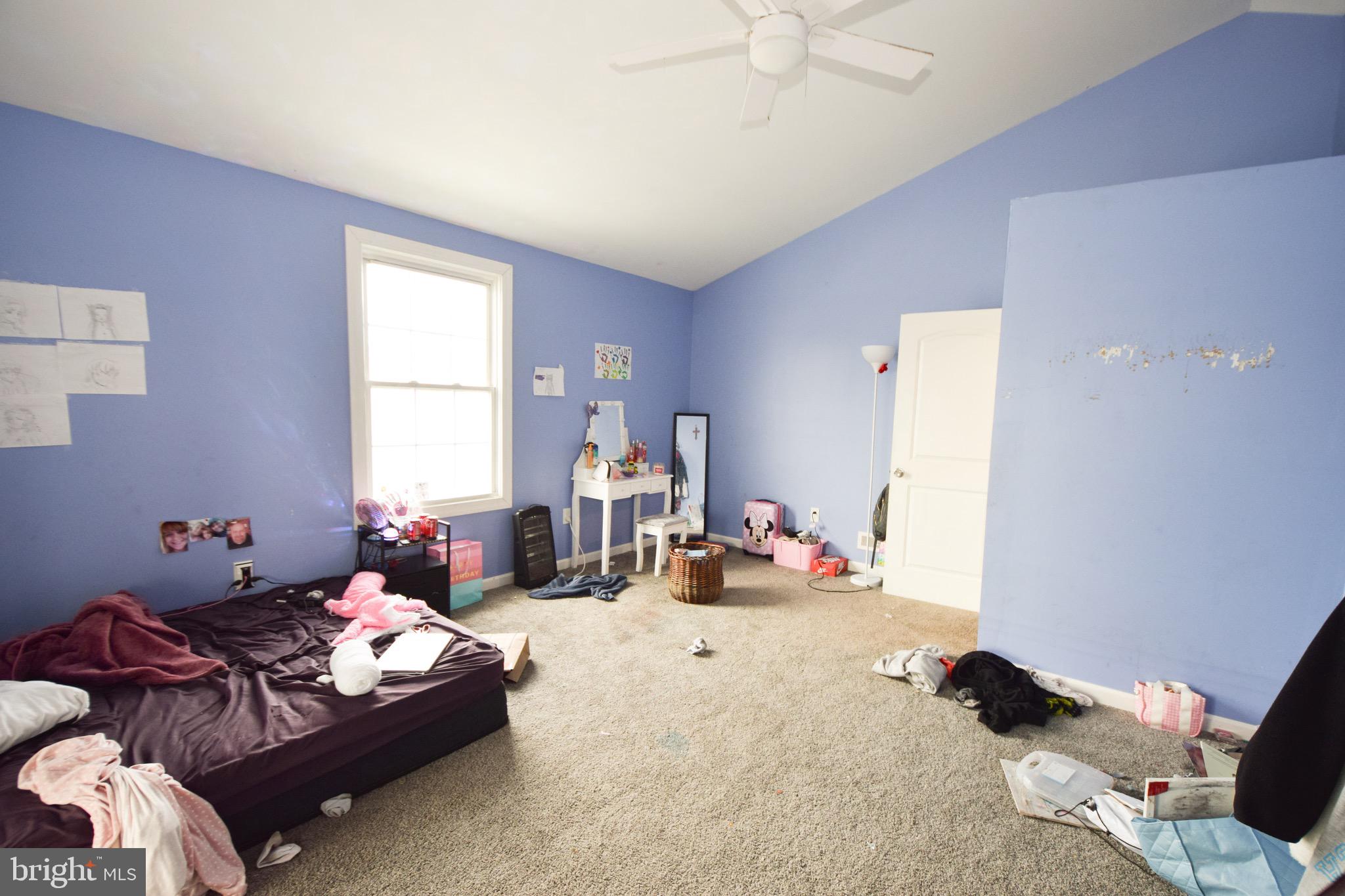 2707 McComas Avenue Baltimore, MD 21222 - Photo 20 of 31 a living room with furniture and a window