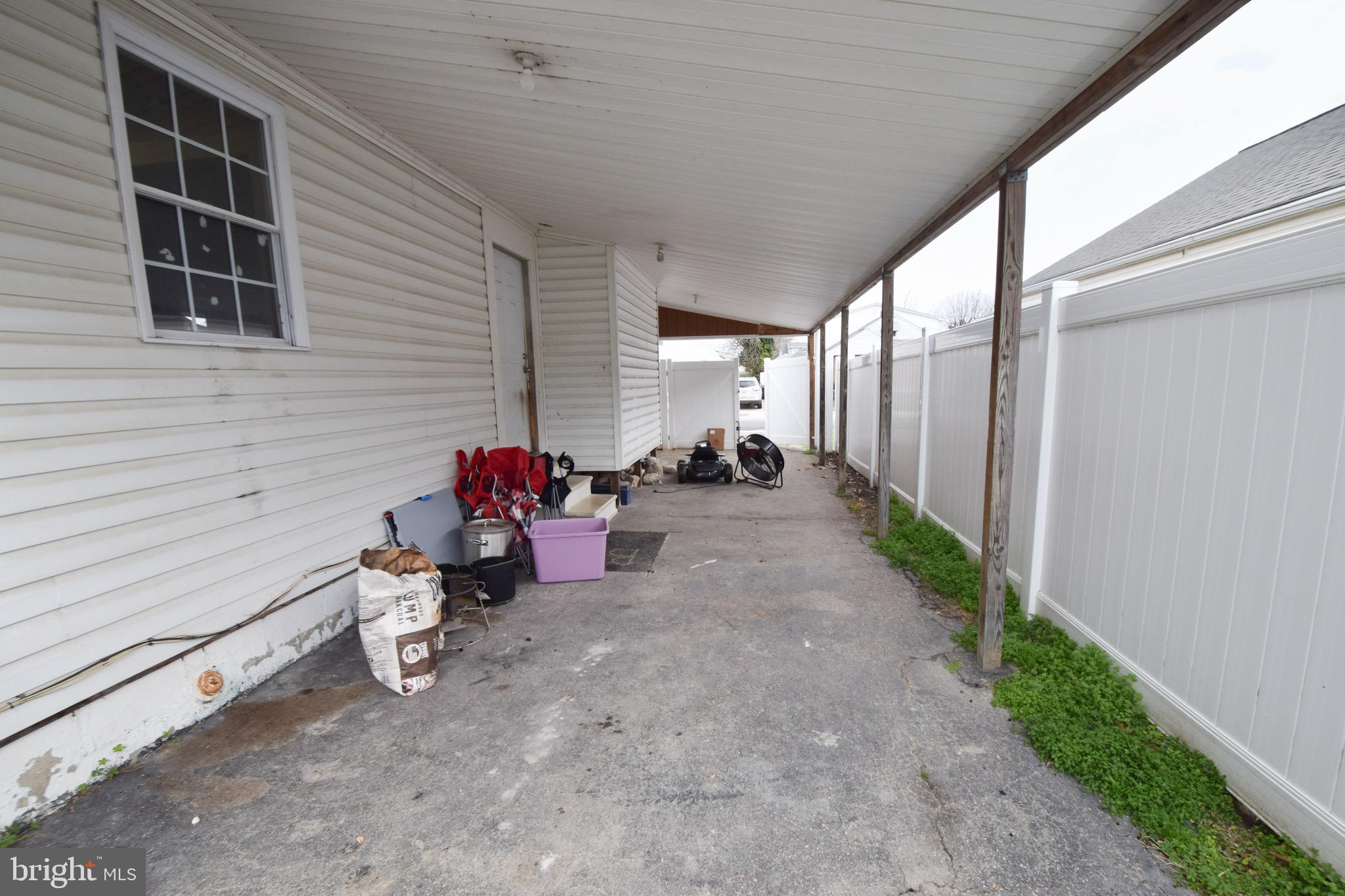 2707 McComas Avenue Baltimore, MD 21222 - Photo 27 of 31 a view of a patio with table and chairs