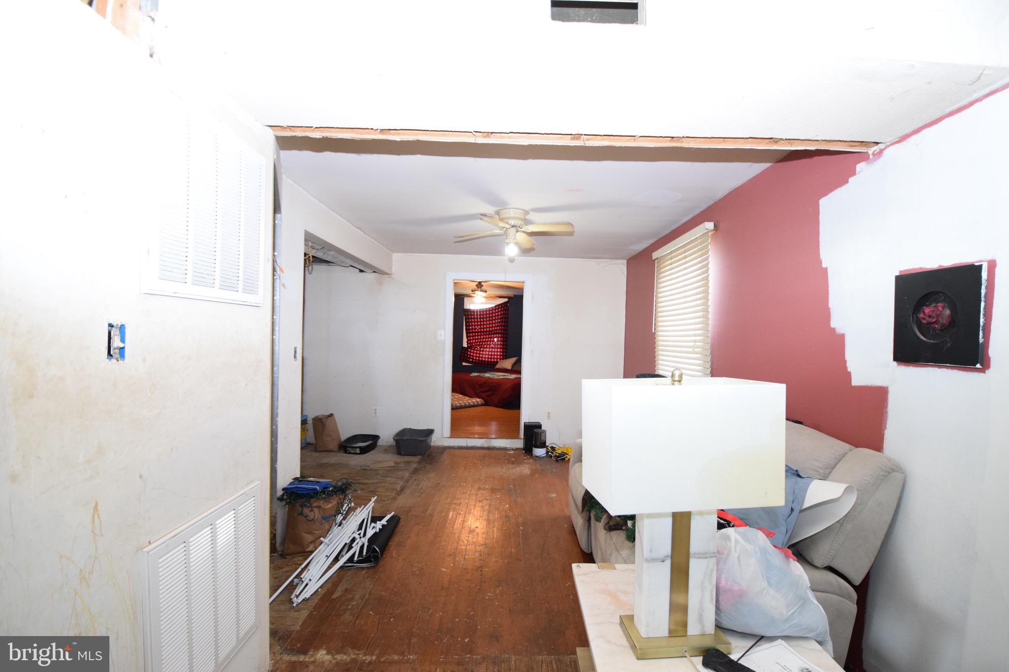 2707 McComas Avenue Baltimore, MD 21222 - Photo 6 of 31 a workspace with furniture and window