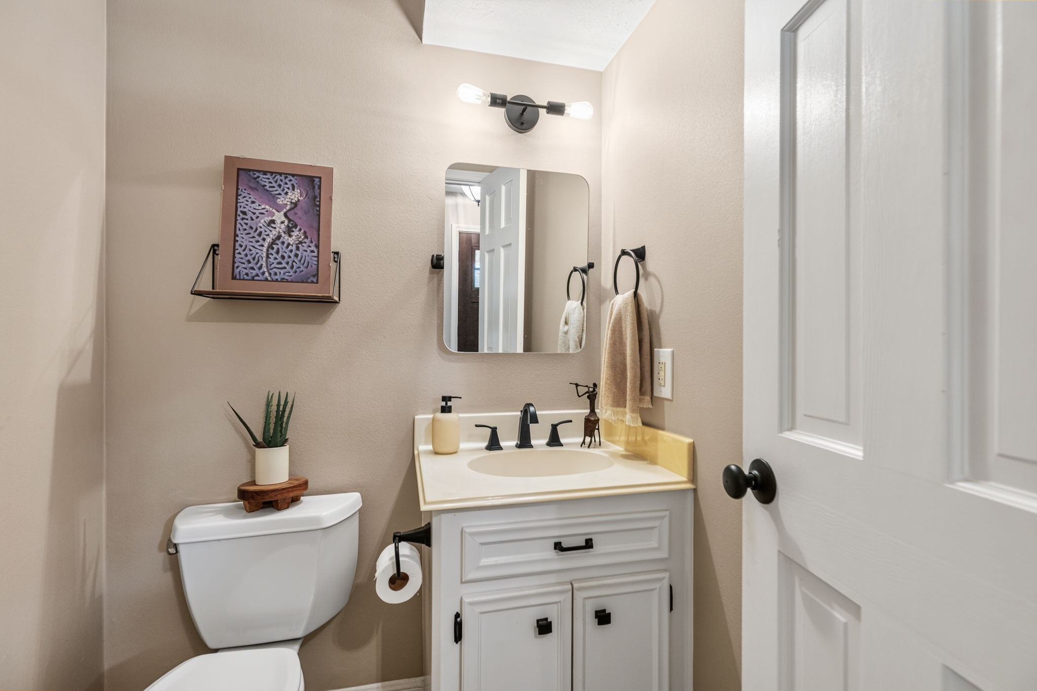 3414 Flaming Candle Drive Spring, TX 77388 - Photo 26 of 50 POWDER ROOM - What an inviting powder room for your guests. Toilet has been updated with a Kohler toilet.