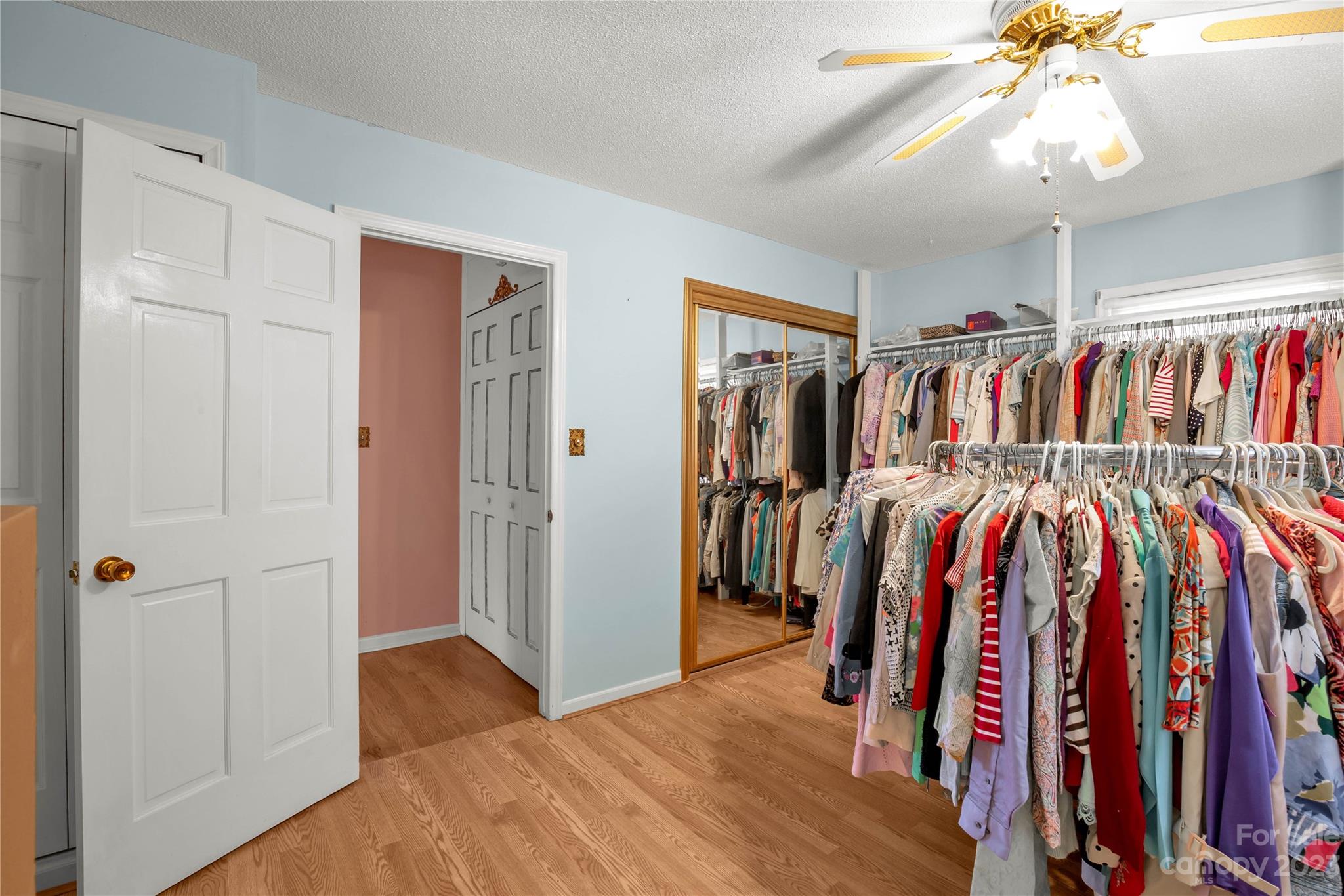 144 State Rd S-46-422 Clover, SC 29710 - Photo 14 of 23 a view of walk in closet with clothes and shoes