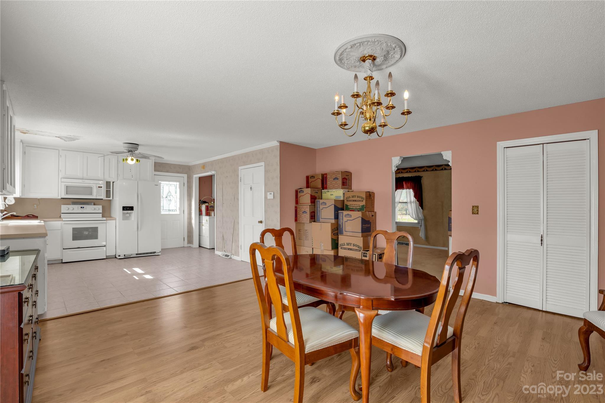 144 State Rd S-46-422 Clover, SC 29710 - Photo 15 of 23 a view of a dining room with furniture and chandelier