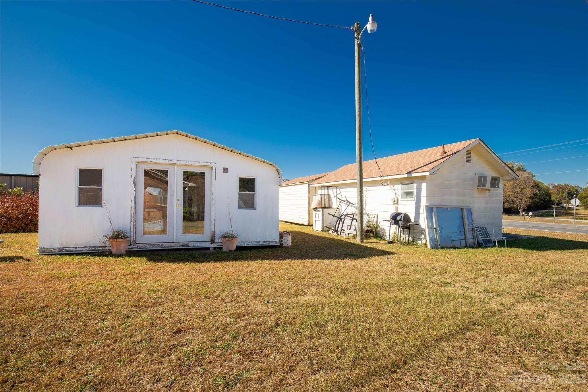144 State Rd S-46-422 Clover, SC 29710 - Photo 20 of 23 a view of a house with a yard