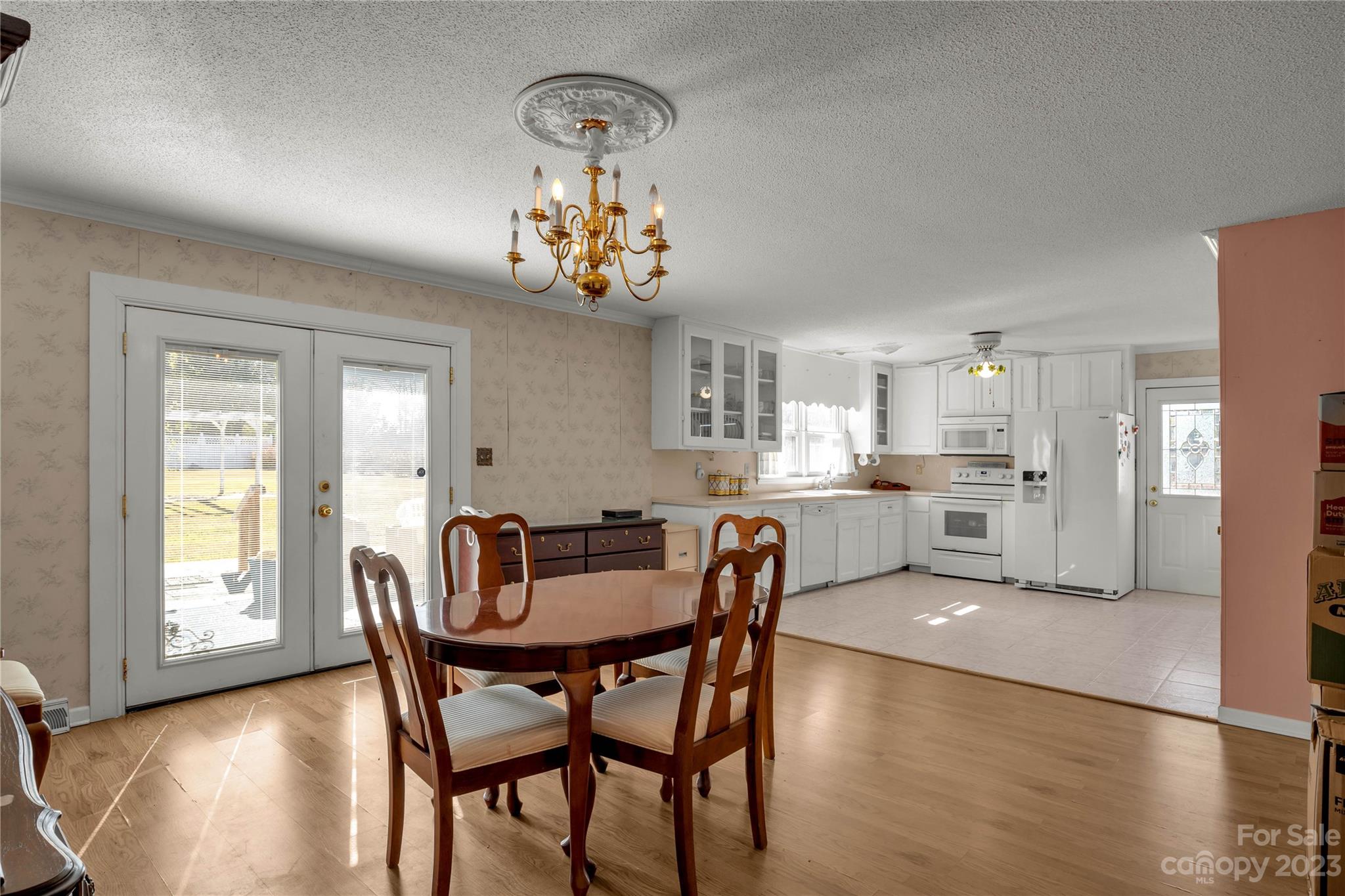 144 State Rd S-46-422 Clover, SC 29710 - Photo 4 of 23 a view of a dining room with furniture and chandelier