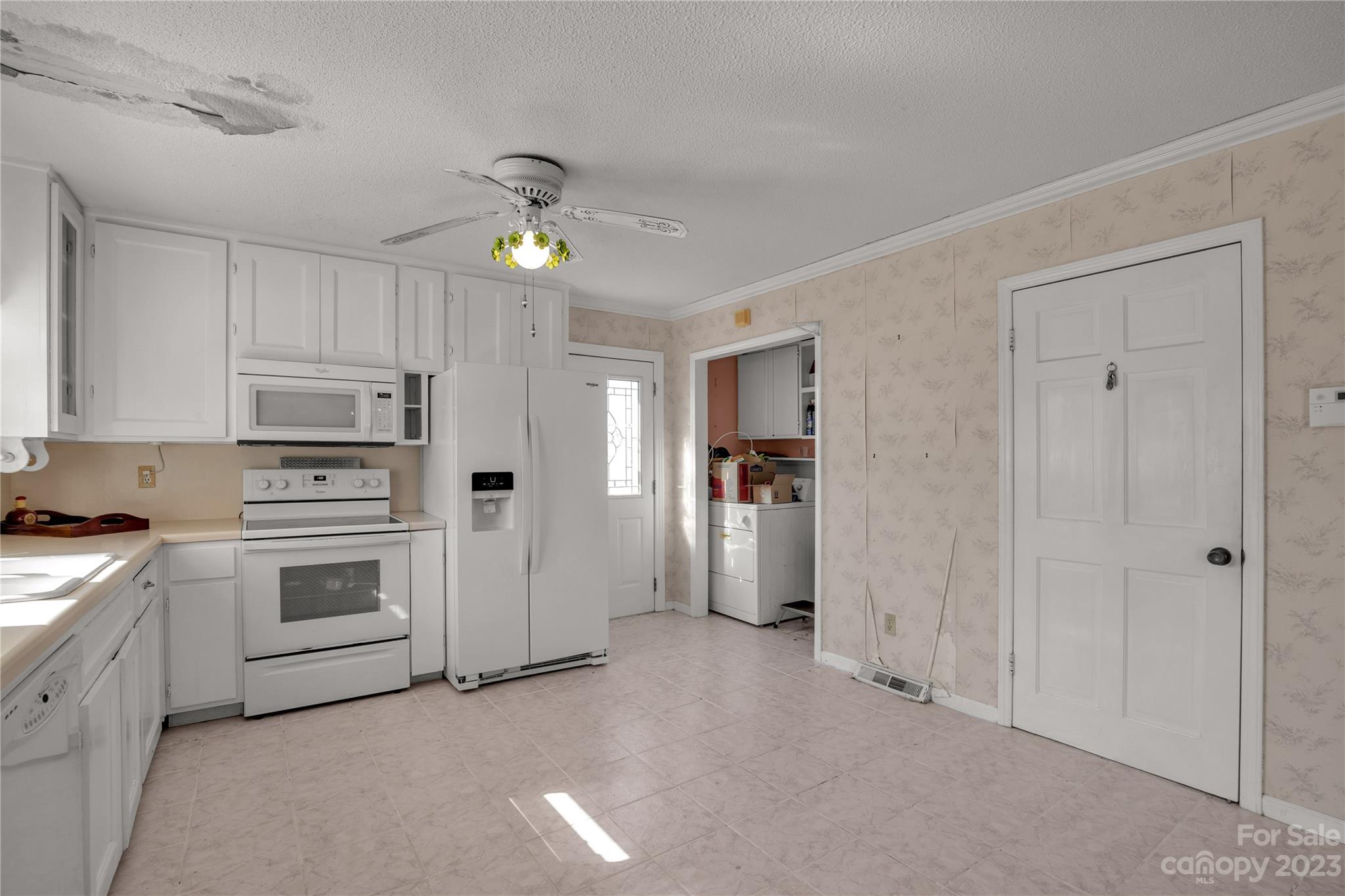 144 State Rd S-46-422 Clover, SC 29710 - Photo 6 of 23 a kitchen with cabinets stainless steel appliances and a window