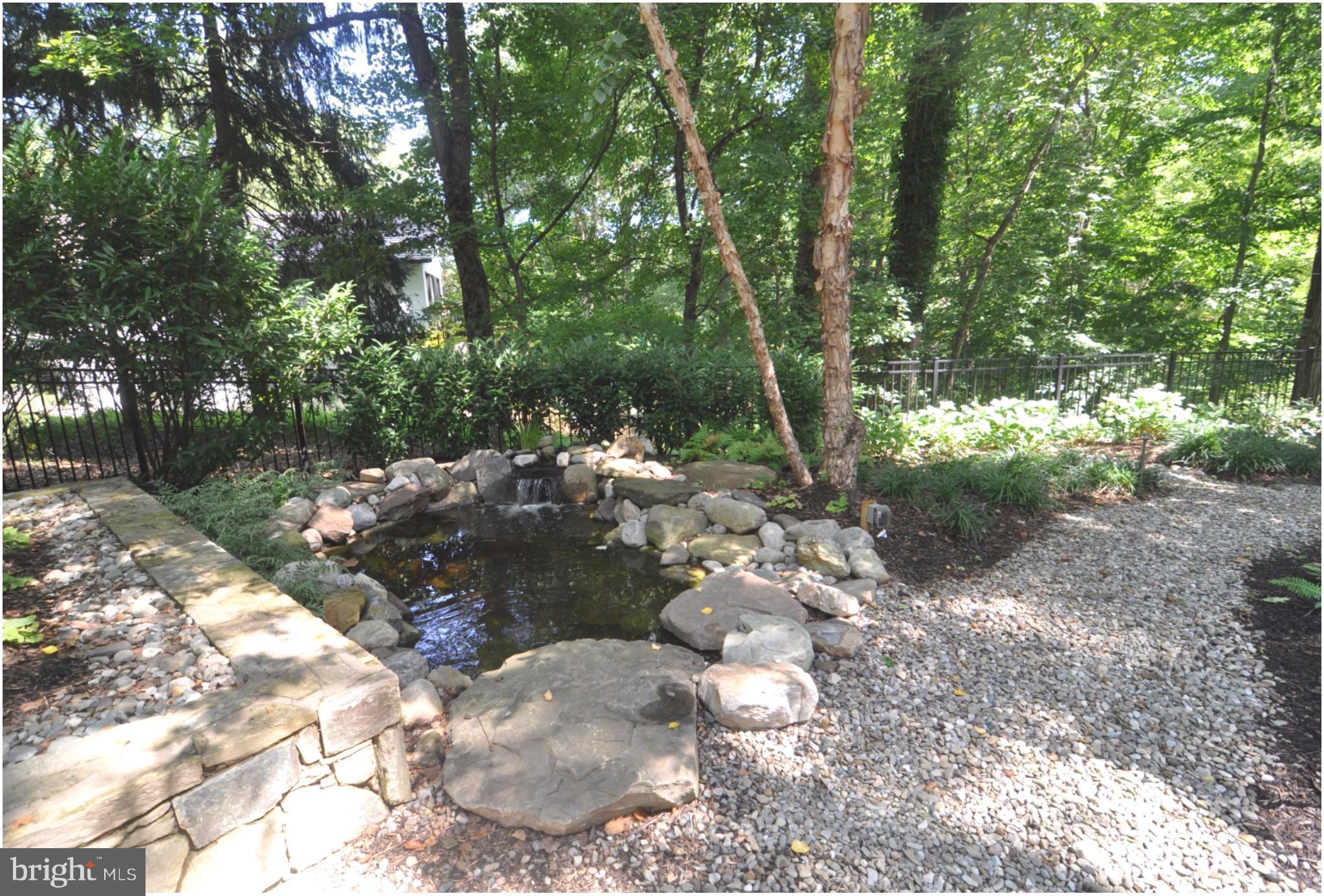947 Swinks Mill Road McLean, VA 22102 - Photo 10 of 30 Stone Fish Pond WITH WATER FALL