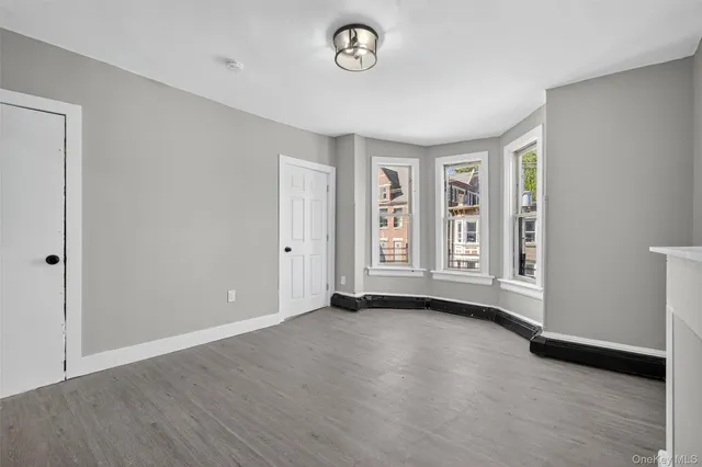 an empty room with windows