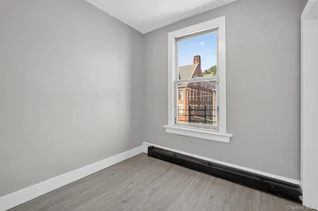 a view of a room that has a window in it