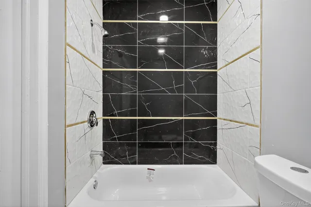 a bathroom with a bathtub